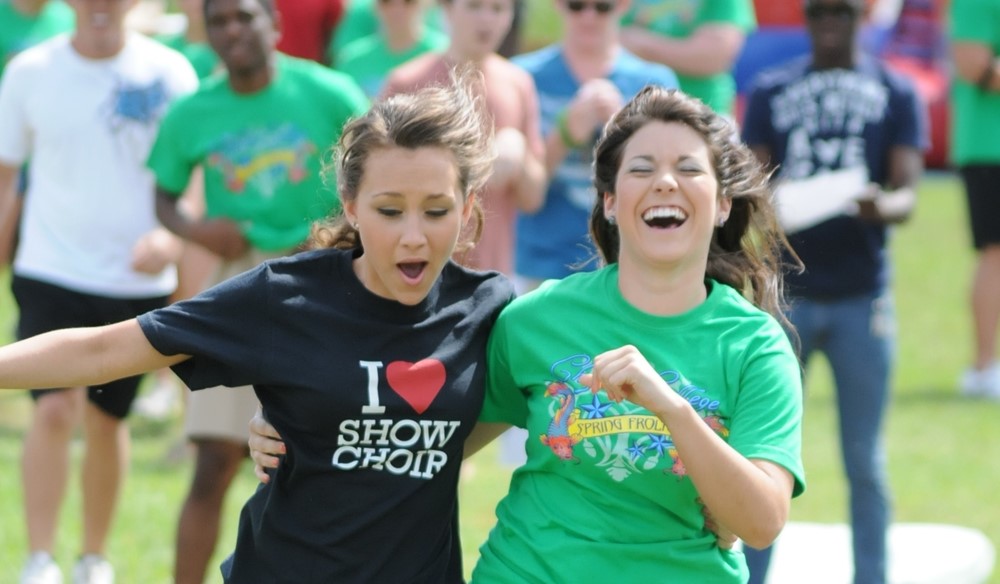 Students running during the Spring Frolics