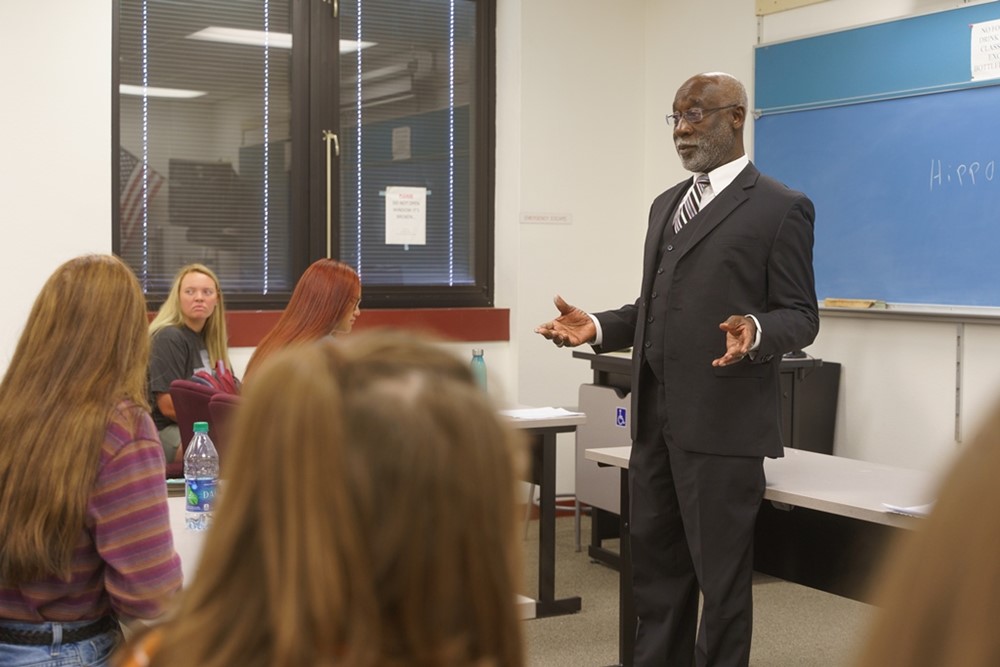 Professor teaching in class