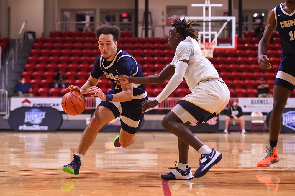 Student playing basketball